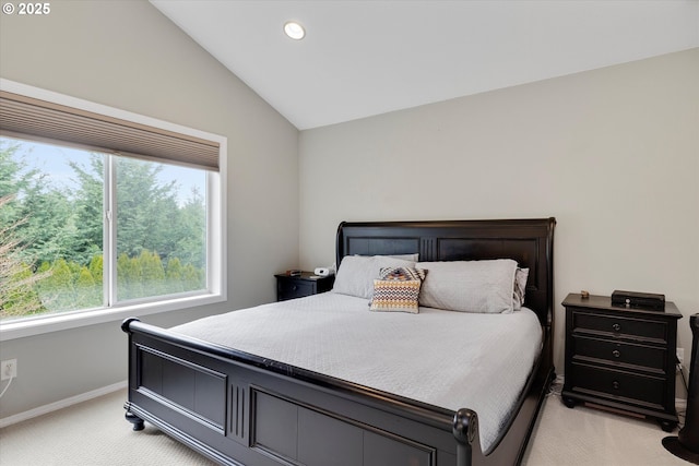 bedroom featuring recessed lighting, baseboards, vaulted ceiling, and light colored carpet