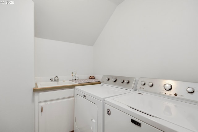 washroom featuring a sink and washing machine and clothes dryer