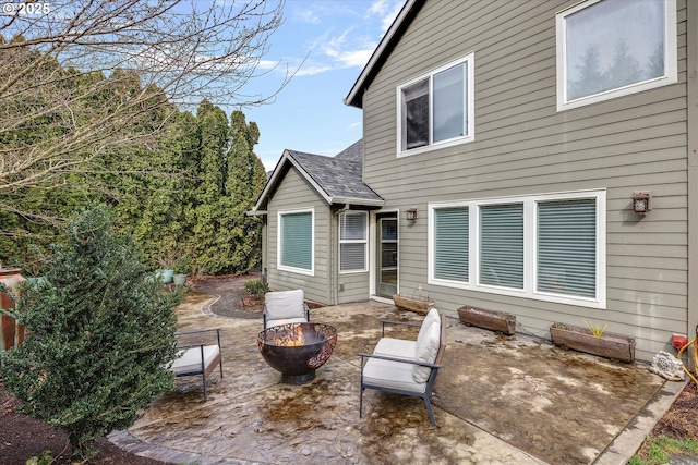 view of patio / terrace featuring a fire pit