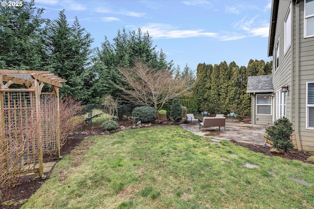 view of yard featuring fence, an outdoor hangout area, a pergola, and a patio