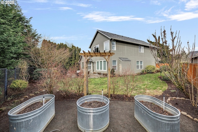 view of patio with a fenced backyard and a pergola