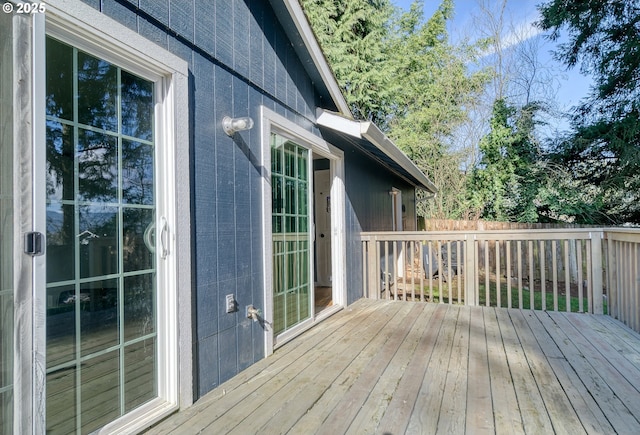 wooden deck featuring fence