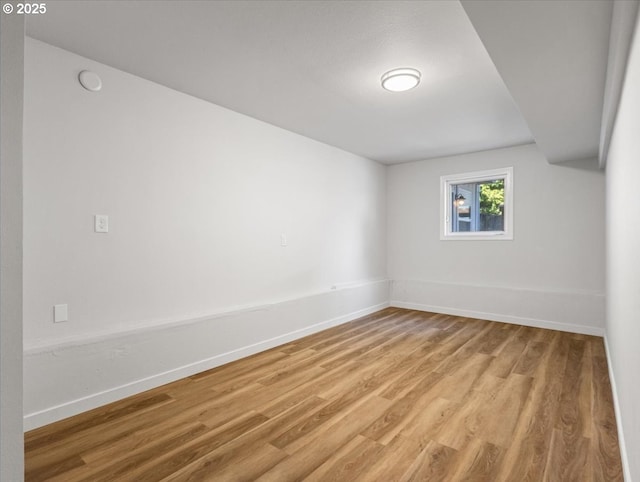 9995 SW Siuslaw Ln, Tualatin, OR 97062 - empty room with light wood-style flooring and baseboards