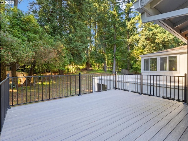 9995 SW Siuslaw Ln, Tualatin, OR 97062 - wooden terrace featuring view of wooded area
