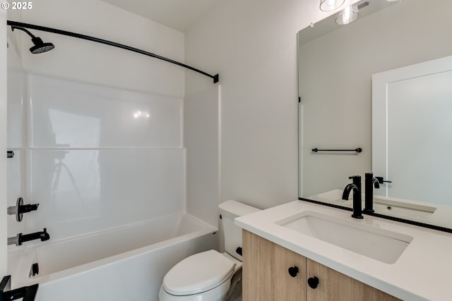 bathroom with toilet, washtub / shower combination, and vanity