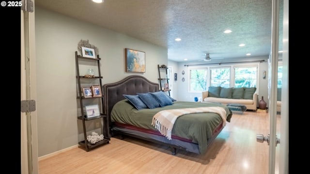 2280 NW 5th St, Gresham, OR 97030 - bedroom featuring recessed lighting, a textured ceiling, and wood finished floors