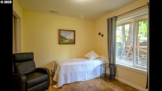 2280 NW 5th St, Gresham, OR 97030 - bedroom featuring visible vents, baseboards, and wood finished floors