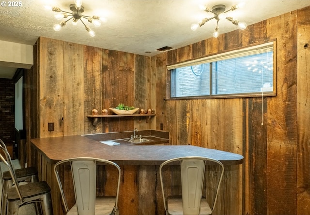 2280 NW 5th St, Gresham, OR 97030 - bar featuring wet bar, wood walls, and visible vents