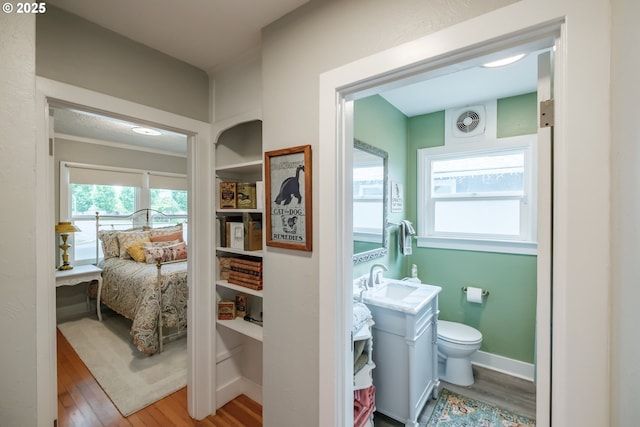 1180 16th St NE, Salem, OR 97301 - bathroom with vanity and wood finished floors