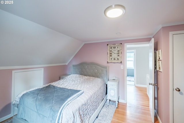 1180 16th St NE, Salem, OR 97301 - bedroom with light wood-type flooring and lofted ceiling