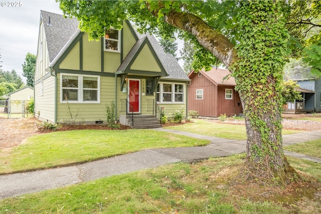 1180 16th St NE, Salem, OR 97301 - view of front of property featuring a shingled roof and a front yard