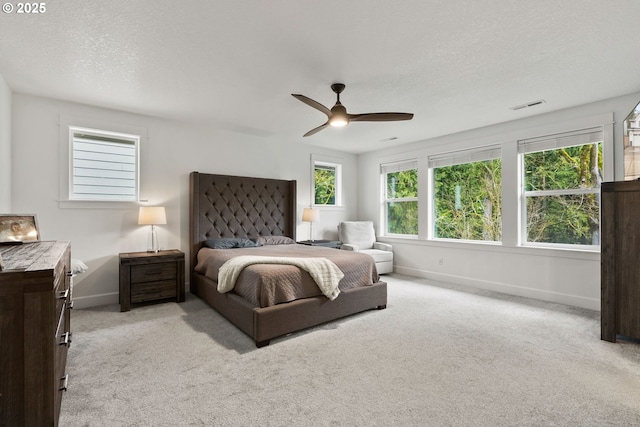 15955 SE Cherry Blossom Way, Happy Valley, OR 97015 - carpeted bedroom featuring a textured ceiling and ceiling fan