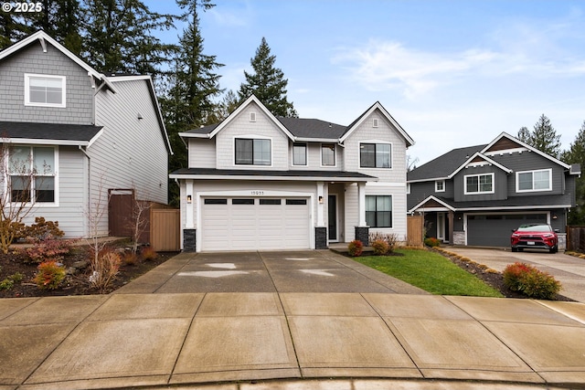 15955 SE Cherry Blossom Way, Happy Valley, OR 97015 - craftsman house with a garage, driveway, and stone siding