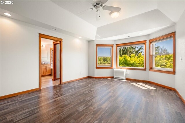 spare room with baseboards, wood finished floors, ceiling fan, and recessed lighting
