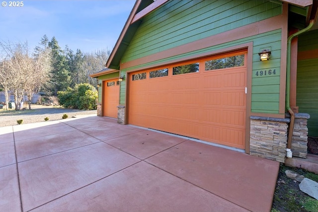 garage with driveway