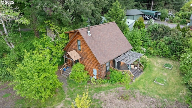 49164 Mckenzie Hwy, Vida, OR 97488 - dining space featuring light wood finished floors, a wood stove, wooden walls, and recessed lighting