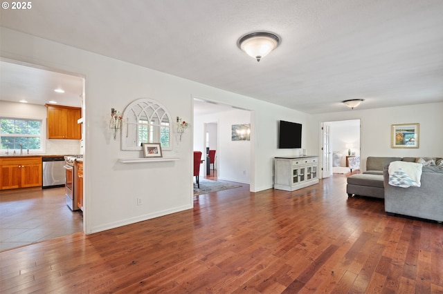 5239 Madrona St, Lake Oswego, OR 97035 - living area featuring dark wood-type flooring and baseboards