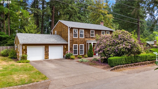 5239 Madrona St, Lake Oswego, OR 97035 - view of front of home featuring an attached garage, a chimney, driveway, and roof with shingles