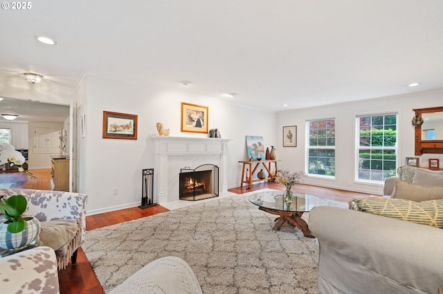5239 Madrona St, Lake Oswego, OR 97035 - living room featuring wood finished floors, a high end fireplace, crown molding, and recessed lighting