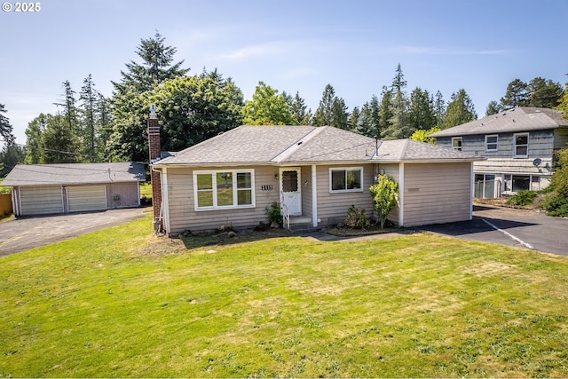 3111 Lindsey Dr, Longview, WA 98632 - view of front of house with a front lawn, a chimney, and an outdoor structure