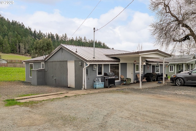 view of front of home featuring metal roof