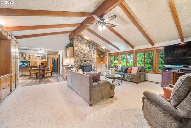 14000 NE 97th Ave, Vancouver, WA 98662 - living area with a ceiling fan, a fireplace, a textured ceiling, and carpet flooring