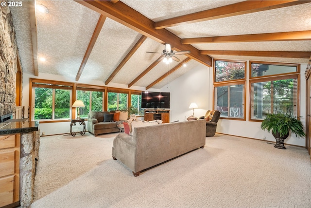 14000 NE 97th Ave, Vancouver, WA 98662 - carpeted living room with a textured ceiling, baseboards, a stone fireplace, and a ceiling fan
