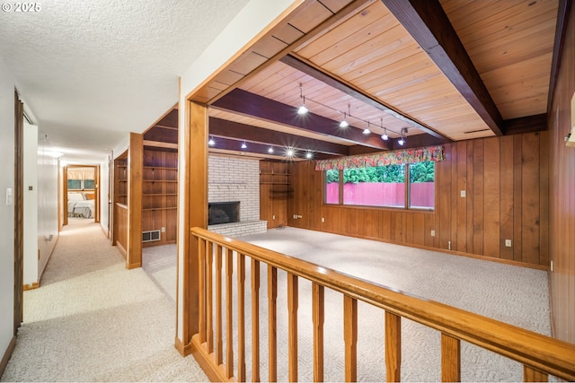 14000 NE 97th Ave, Vancouver, WA 98662 - hall with carpet floors, wood walls, and wood ceiling with exposed beams