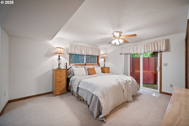 14000 NE 97th Ave, Vancouver, WA 98662 - bedroom featuring access to exterior, light carpet, baseboards, and a textured ceiling