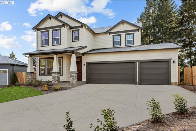 craftsman house with a garage and a porch