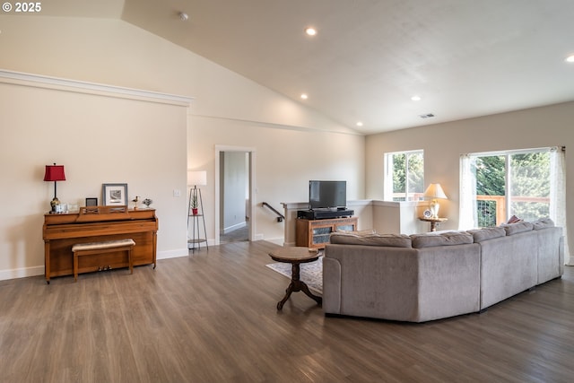 living area featuring visible vents, recessed lighting, baseboards, and wood finished floors