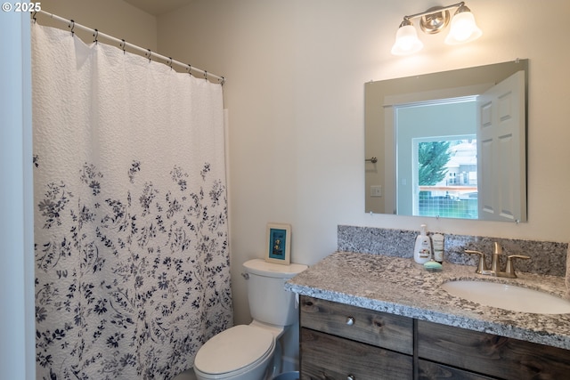 full bath with vanity and toilet