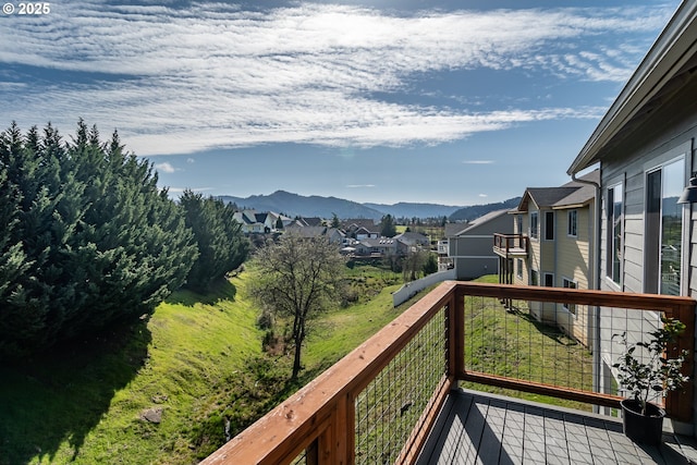 balcony featuring a mountain view and a residential view