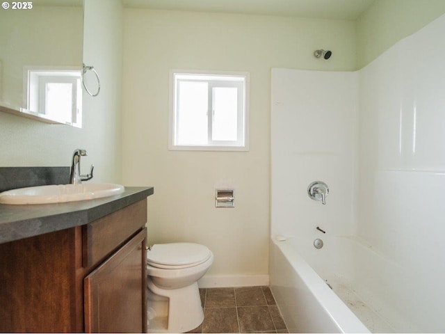 934 SE Nehalem St, Portland, OR 97202 - bathroom featuring healthy amount of natural light, vanity, toilet, and baseboards