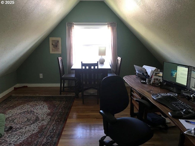 934 SE Nehalem St, Portland, OR 97202 - office area featuring a textured ceiling, vaulted ceiling, wood finished floors, and baseboards