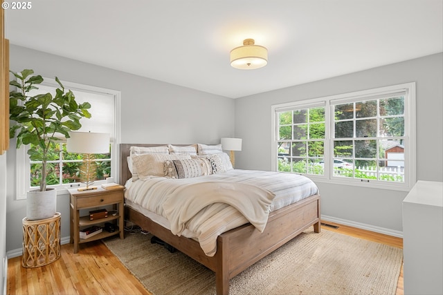 630 9th St, Lake Oswego, OR 97034 - bedroom featuring light wood finished floors and baseboards