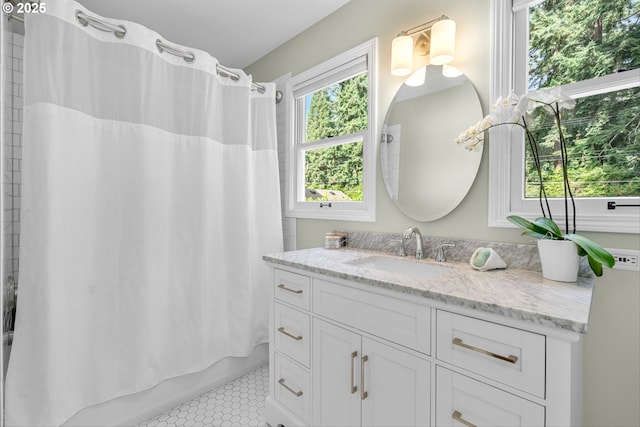 630 9th St, Lake Oswego, OR 97034 - full bathroom with vanity, tile patterned floors, and shower / bath combination with curtain