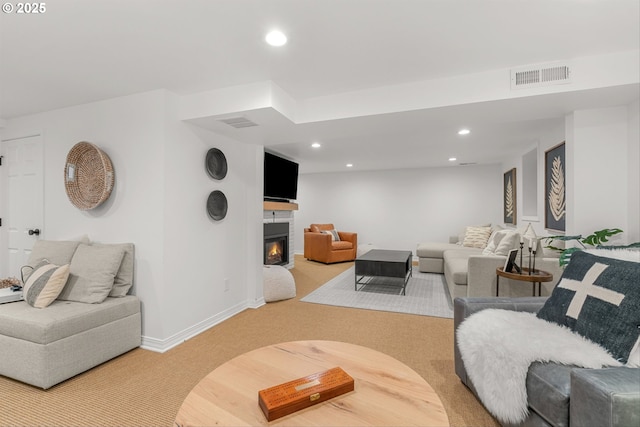 630 9th St, Lake Oswego, OR 97034 - carpeted living area featuring recessed lighting and a lit fireplace