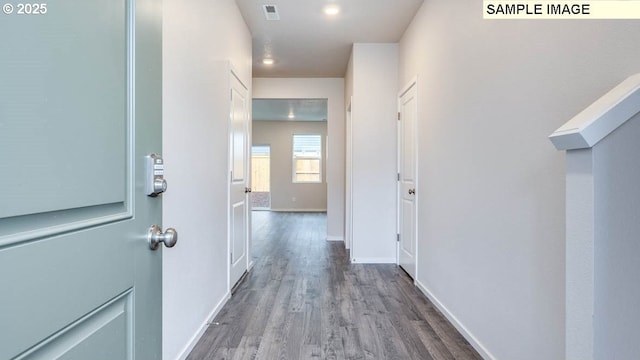 hallway featuring hardwood / wood-style floors