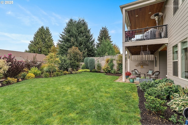6435 SE Ketchum St, Milwaukie, OR 97267 - view of yard featuring a balcony and a patio area