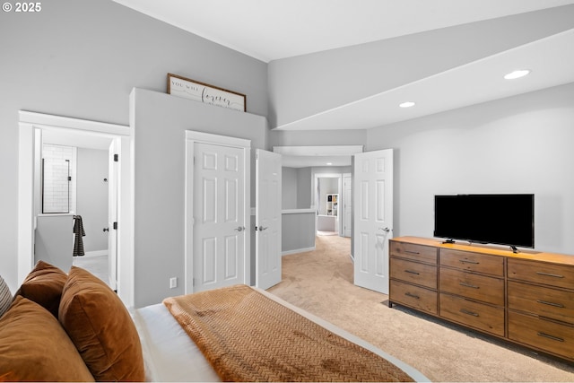 bedroom with recessed lighting and light carpet