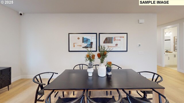 14924 NW Legend St, Portland, OR 97229 - dining area with light hardwood / wood-style flooring