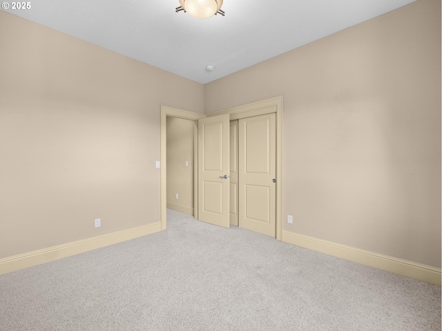 unfurnished bedroom with carpet floors