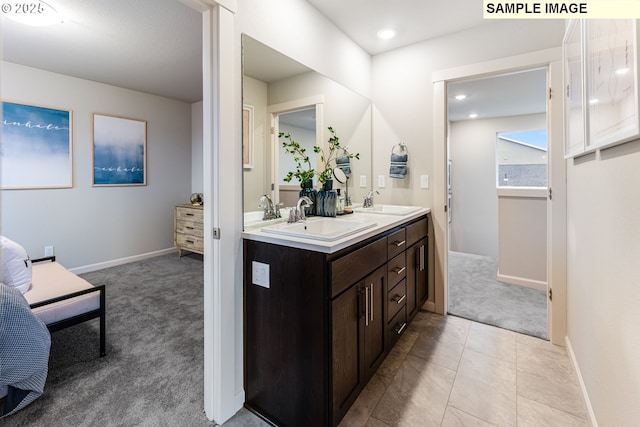 23623 SW Landon Pl, Tualatin, OR 97062 - bathroom with double vanity, baseboards, recessed lighting, and tile patterned flooring