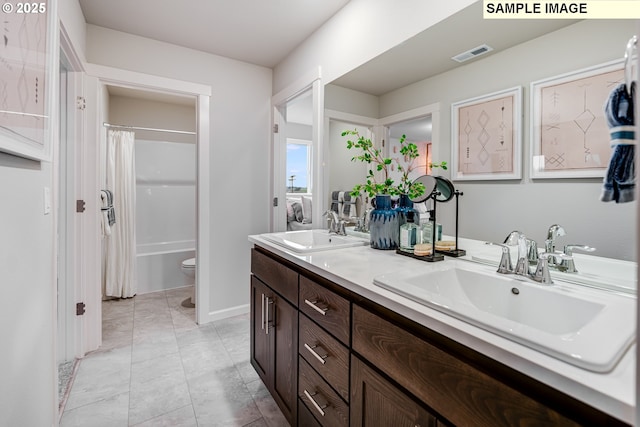 23623 SW Landon Pl, Tualatin, OR 97062 - bathroom featuring double vanity, shower / bathtub combination with curtain, and toilet