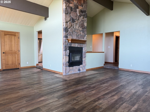 unfurnished living room with high vaulted ceiling, beamed ceiling, and visible vents