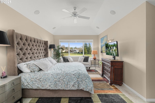 bedroom featuring lofted ceiling, ceiling fan, and baseboards