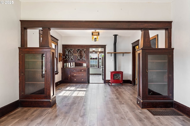 622 C St, Washougal, WA 98671 - entrance foyer featuring a wood stove and wood finished floors