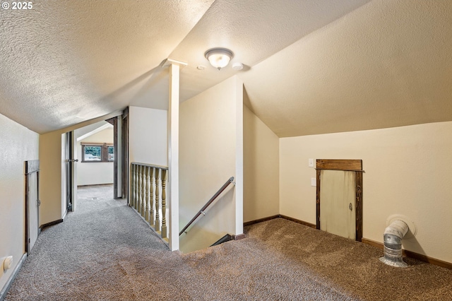 622 C St, Washougal, WA 98671 - additional living space with a textured ceiling, carpet flooring, and lofted ceiling
