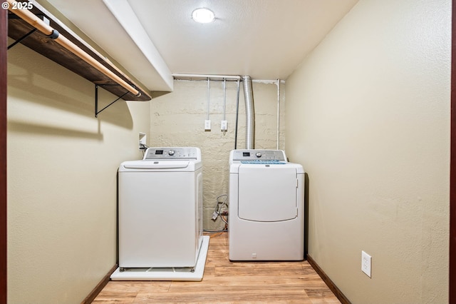 622 C St, Washougal, WA 98671 - laundry area with washing machine and clothes dryer and light wood-style floors